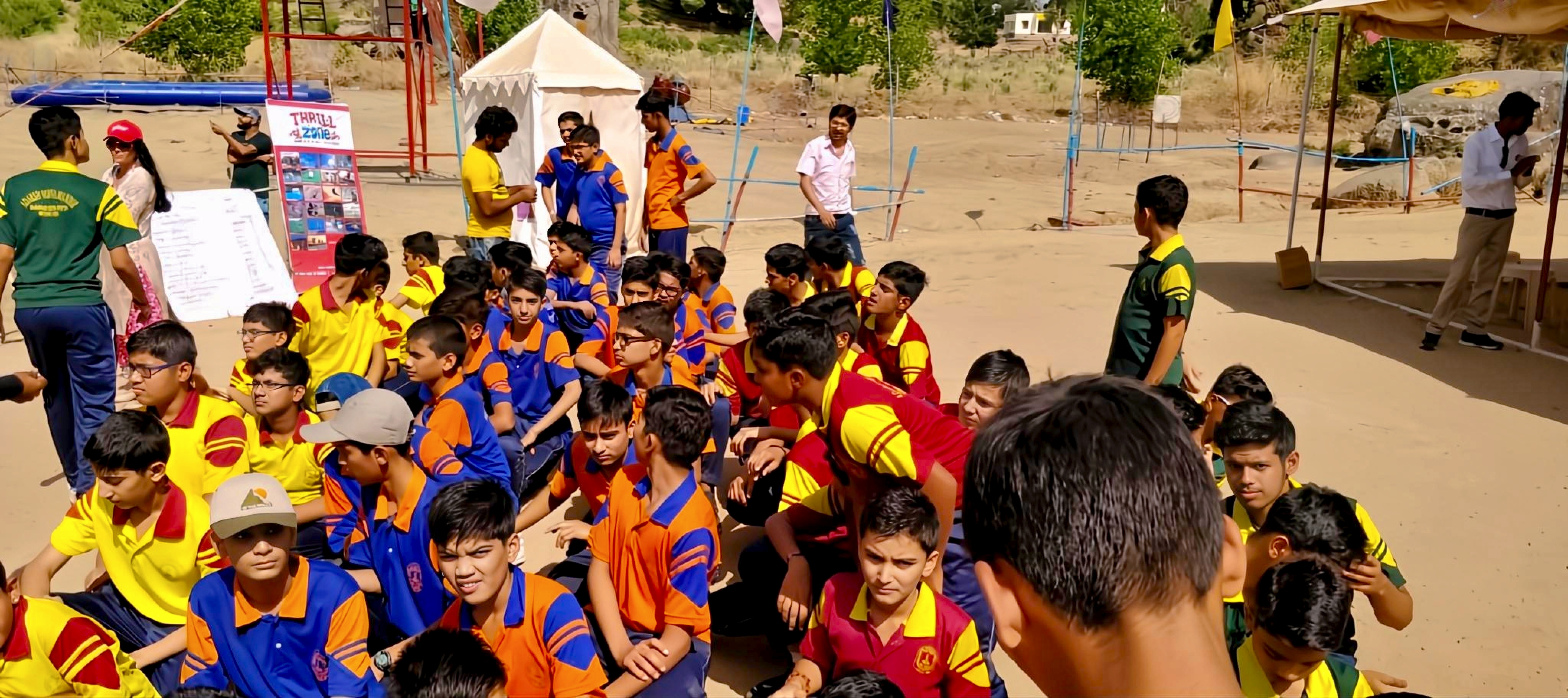 School students gathered outdoors at SkyTrek Adventure in Mount Abu