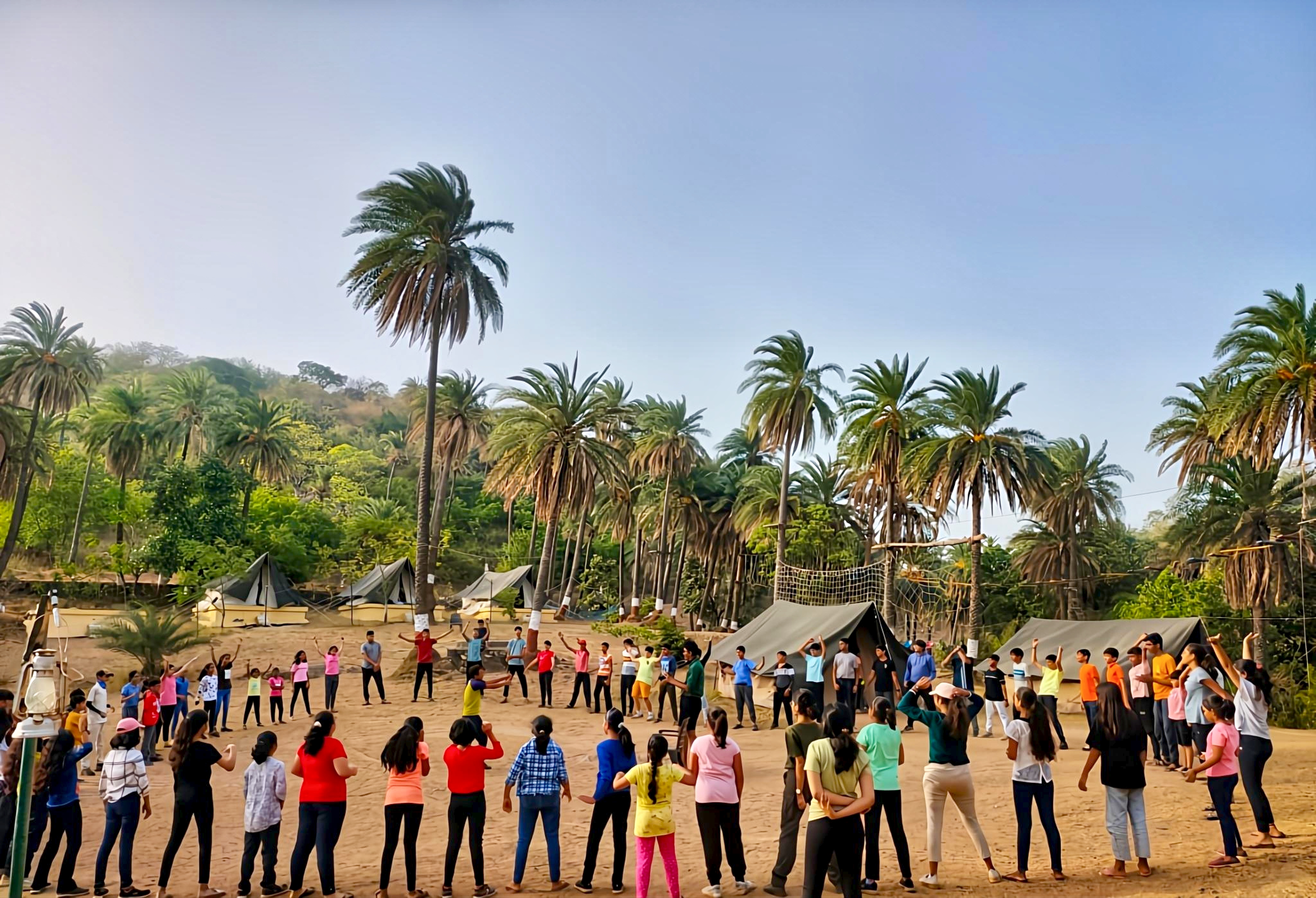 A group enjoying outdoor activities among trees at SkyTrek Adventure in Mount Abu